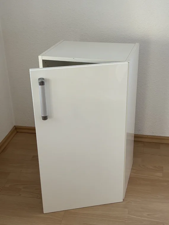 Photograph 1 of 2 of the kitchen cabinet.