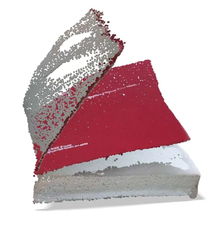 The hardcover book as a dense colored point cloud, reconstructed from the photographs.