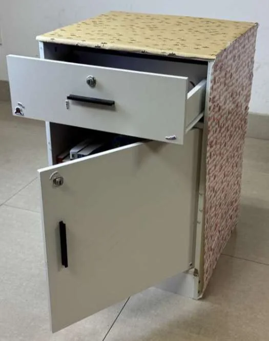 Photograph 1 of 2 of the metal cabinet.